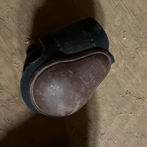Brown hind boots size large will be washed